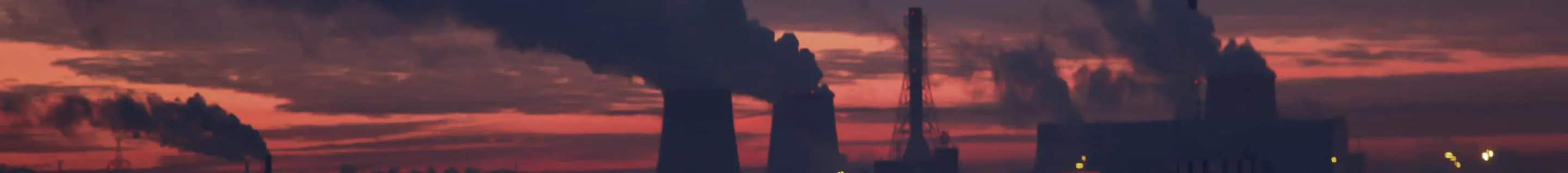 Sunrise over a power plant