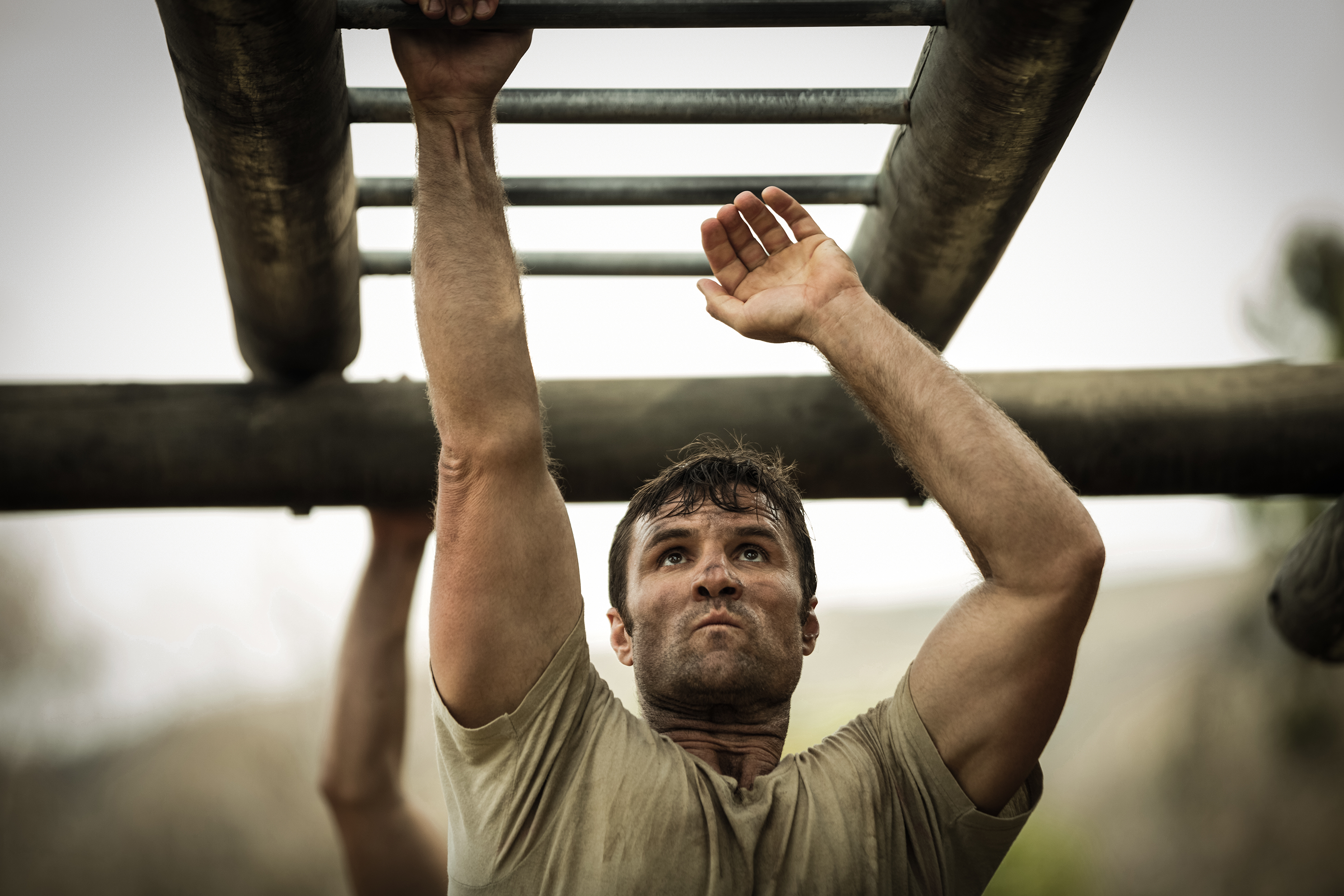 A man training on hanging bars