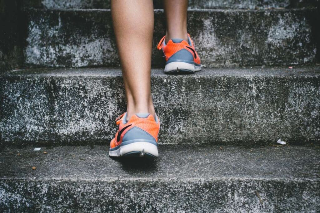 A person stepping on a stairs.